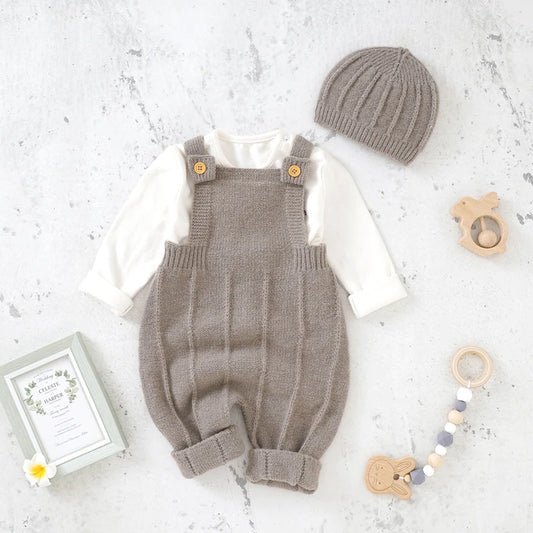 Knitted newborn rompers and hats set in neutral tones for infants with cute buttons and rolled cuffs