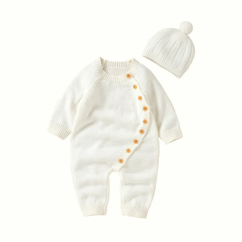 Newborn long sleeve romper with hat in white, featuring button closure and soft knit for warmth in fall winter 2023
