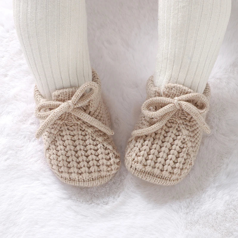 Knitted newborn baby shoes in beige, perfect toddler footwear fashion for infants up to 18 months